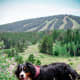 A Bernese Mountain Dog out for a hike